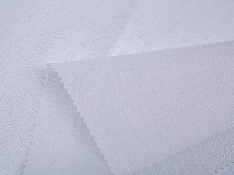 Kenapa T/C Woven Fusible Shirt Interlining dengan ketara meningkatkan keselesaan baju?
